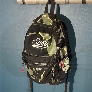 Ecko Unlimited Camouflage Backpack with Black and Green Accents